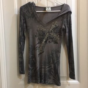 Top w/hood. Cross & fleur de lis embellishments